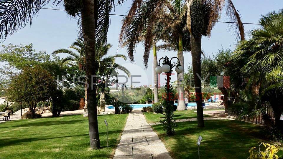 garden and swimming pool view