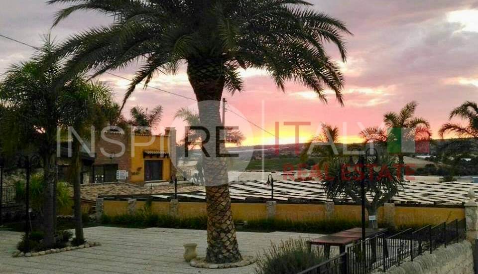 sunset from garden and restaurant outdoor area